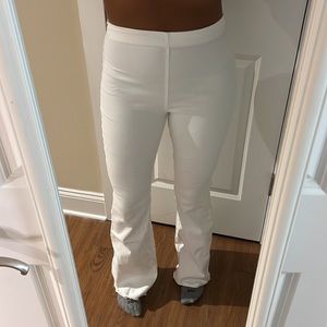 Cream flare jeans.